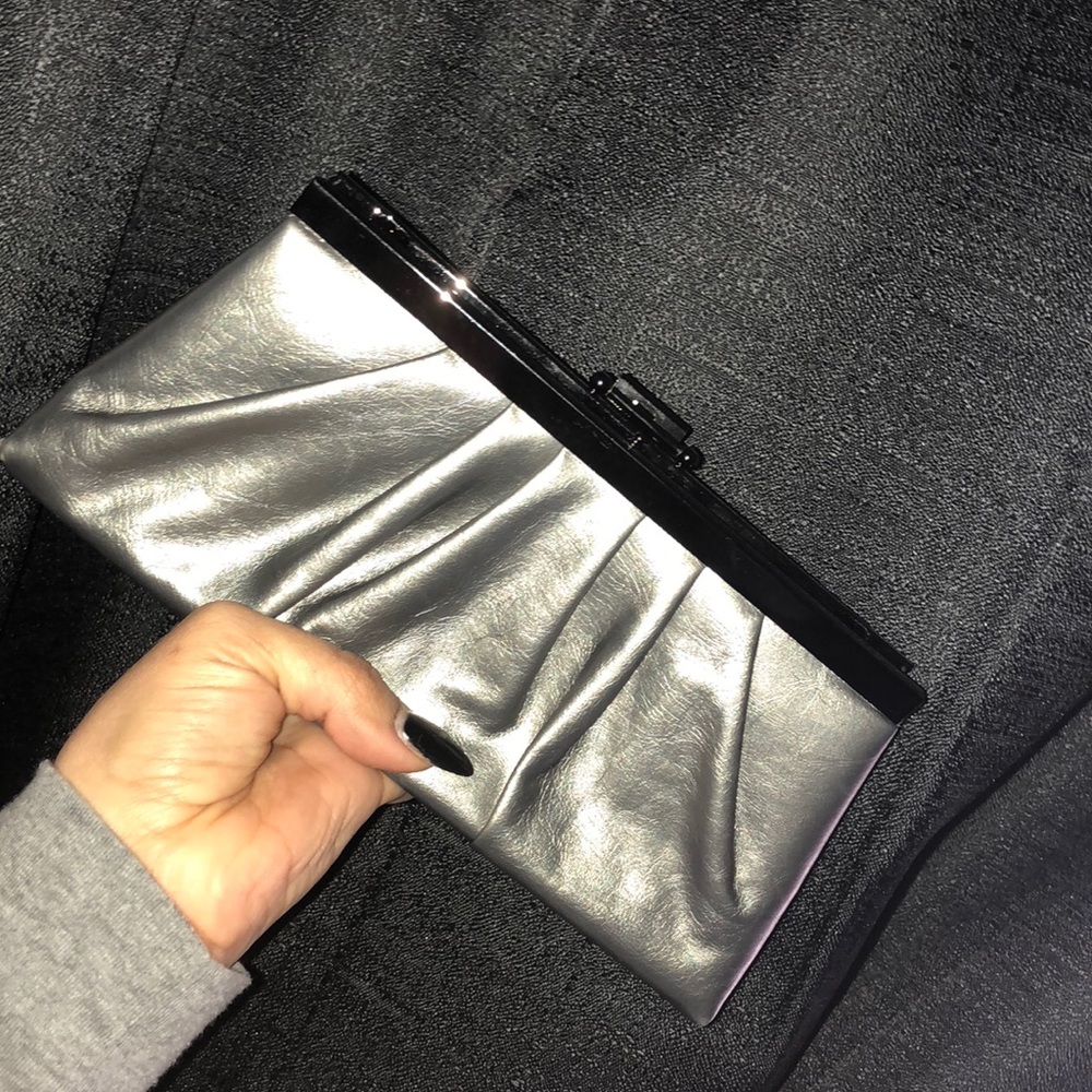 Clutch/adjustable bag